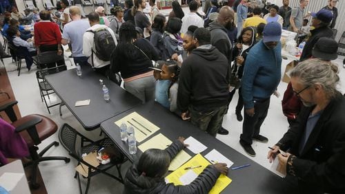 The wait time to vote at the Pittman Park precinct in Atlanta was reported to be three hours. The Fulton Board of Elections heard complaints from residents who worried about voter suppression. BOB ANDRES / BANDRES@AJC.COM AJC FILE PHOTO