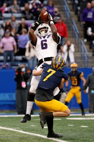 Trinity Christian wide receiver Aaron Gates (6) makes a catch against Prince Avenue Christian defensive back Phillip Kelley (7) in the first half of the Class 1A Private championship at Center Parc Stadium Monday, December 28, 2020 in Atlanta, Ga.. JASON GETZ FOR THE ATLANTA JOURNAL-CONSTITUTION