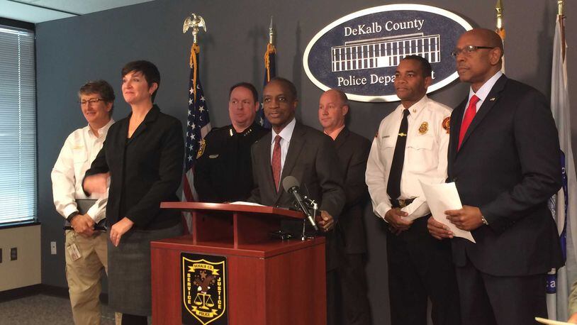 DeKalb County CEO Mike Thurmond, center, and emergency officials warn residents to prepare for a snow storm that could arrive Friday evening. The spoke at a press conference Thursday at DeKalb police headquarters. From left: Susan Loeffler, director for the DeKalb Emergency Management Agency; Donna Flanders, a nationally certified ASL interpreter; Police Chief James Conroy; Thurmond; 911 Director Marshall Mooneyham; Fire Chief Darnell Fullum; Public Safety Director Cedric Alexander. MARK NIESSE / MARK.NIESSE@AJC.COM