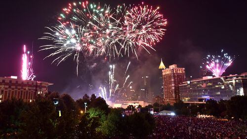 July 4, 2016 Atlanta - The finale fireworks spectacular light up over the Downtown skyline during Centennial Olympic Park's Fourth of July Celebration on Monday, July 4, 2016. HYOSUB SHIN / HSHIN@AJC.COM