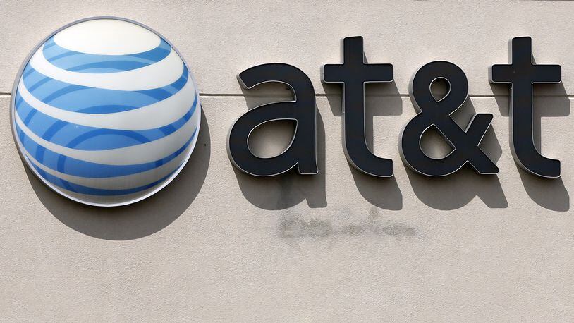 AT&T is shifting some of its Atlanta jobs to Los Angeles and Dallas. (AP Photo/Steven Senne, File)