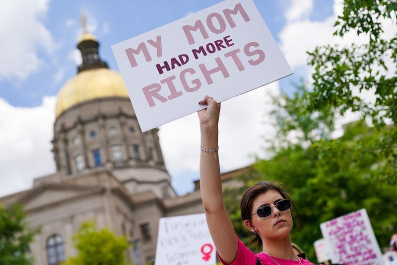 In this photo from May 14, 2022, activists rally outside the State Capitol in support of abortion rights in Atlanta, Georgia. - Thousands of activists are participating in a national day of action calling for safe and legal access to abortion. (Elijah Nouvelage/AFP via Getty Images/TNS)