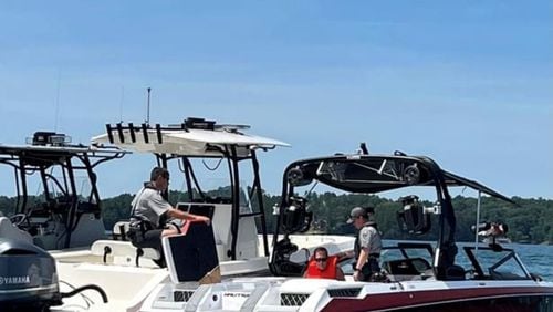 Georgia DNR officers paused their dayslong search for a missing man in Lake Lanier to chase down a stolen ski boat valued at more than $100,000, officials said.