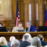 (L-R) Sen. Blake Tillery and Rep. Matt Hatchett confer during budget hearings in Atlanta on Tuesday, January 17, 2023.   (Arvin Temkar / arvin.temkar@ajc.com)