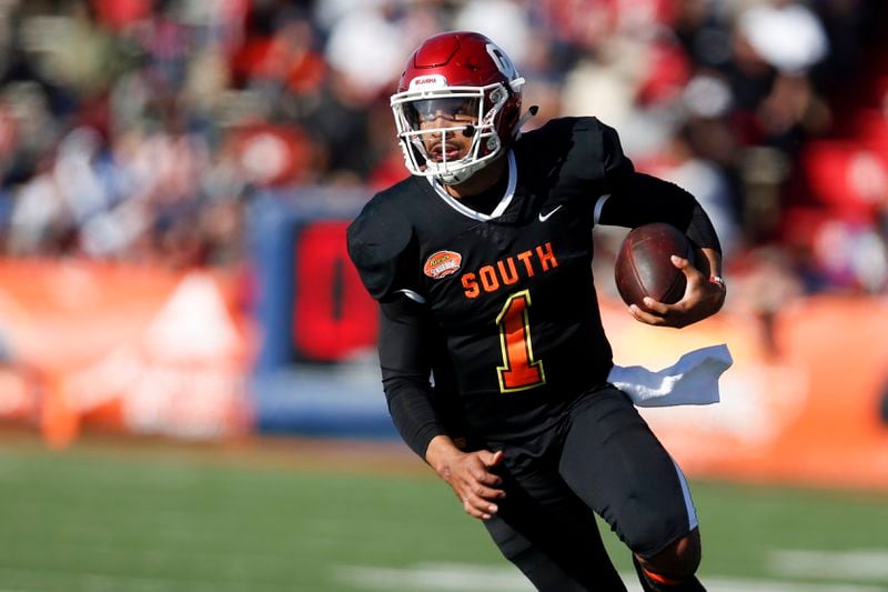 South quarterback Jalen Hurts of Oklahoma (1) scrambles for a first down during the first half of the Senior Bowl college football game Saturday, Jan. 25, 2020, in Mobile, Ala. (AP Photo/Butch Dill)