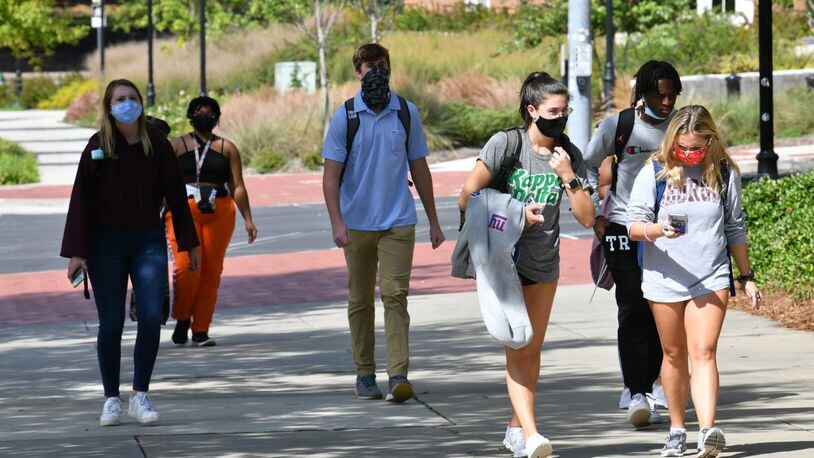 September 23, 2020 Athens - Students mostly wear face masks as they make their way through the campus in the University of Georgia campus in Athens on Wednesday, September 23, 2020. Maia Gibson was diagnosed with COVID near the start of the semester. She's okay now. Gibson now wants UGA to conduct more testing and enact other measures to reduce the spread of COVID-19 on the campus. (Hyosub Shin / Hyosub.Shin@ajc.com)