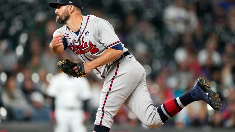 Atlanta Braves reliever Darren O'Day delivers. O’Day, who has pitched in the majors since 2008, entered Saturday’s tie game in the ninth inning. Needing to send the game to extras, manager Brian Snitker went to O’Day, who came through. (AP Photo/David Zalubowski)
