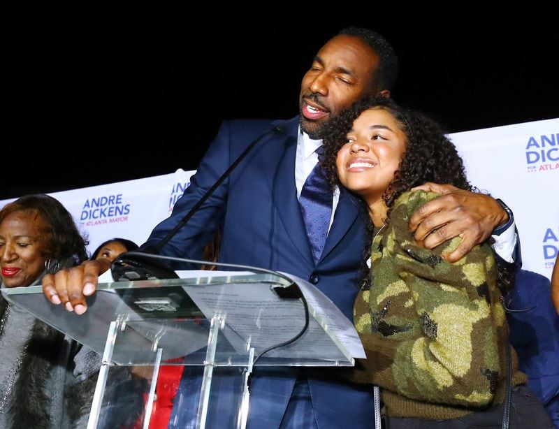113021 Atlanta: Atlanta Mayor-elect Andre Dickens gives his daughter Bailey a hug during his victory address at his election night watch party on Tuesday, Nov. 30, 2021, at the Gathering Spot in Atlanta.   “Curtis Compton / Curtis.Compton@ajc.com”`