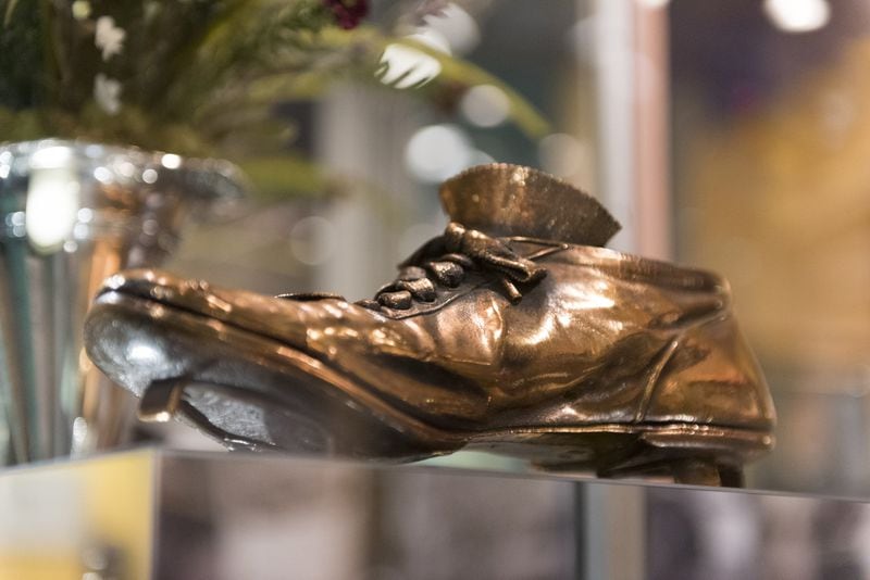 One of Ty Cobb’s original cleats, dipped in bronze, sits in the Ty Cobb Museum in Royston. Cobb, one of Major League Baseball’s great players, was known for his aggressive base running, and he had a reputation for sharpening the spikes of his cleats to intimidate other players. But in 1910, Cobb wrote a letter to the president of the American League asking him to require all players to dull their spikes with a file. (DAVID BARNES / SPECIAL)