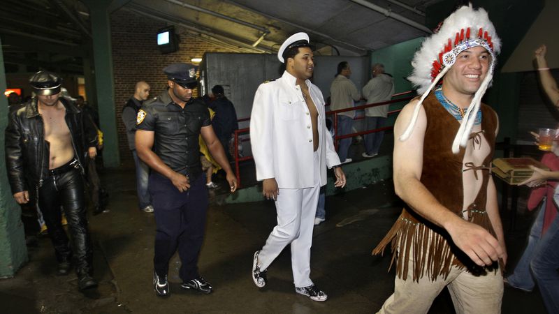 New York Yankees rookie pitcher Alfredo Aceves (right), dressed as the Indian from the 1970's musical group the Village People as he leaves with his rookie teammates in costume as the rest of the band after a baseball game against the Boston Red Sox in Boston in 2008.