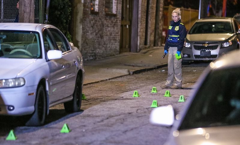 The Georgia Bureau of Investigation is investigating an officer-involved shooting Thursday at La Vie Hookah Bar Bistro on Luckie Street. JOHN SPINK / JSPINK@AJC.COM