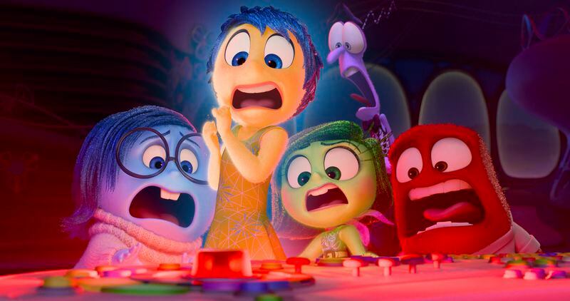 This image released by Disney/Pixar shows, from left, Sadness, voiced by Phyllis Smith, from left, Joy, voiced by Amy Poehler, Disgust, voiced by Liza Lapira, Fear, voiced by Tony Hale and Anger, voiced by Lewis Black in a scene from "Inside Out 2." (Disney/Pixar via AP)