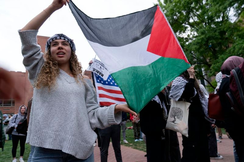 George Washington University students rally on campus during a pro-Palestinian protest over the Israel-Gaza war on Thursday, April 25, 2024, in Washington. (AP Photo/Jose Luis Magana)