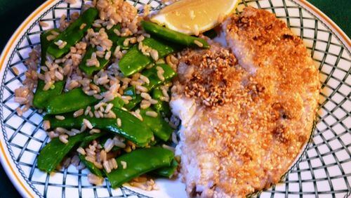 Sesame seeds, fresh ginger and a little butter are the only requirements for this standout snapper dish. (Linda Gassenheimer/TNS)