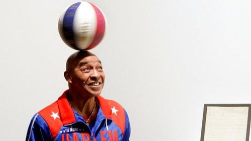 Fred “Curly” Neal,  the dribbling wizard who entertained millions with the Harlem Globetrotters for parts of three decades, died Thursday at age 77.