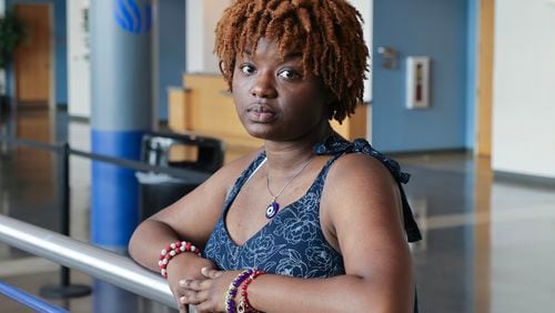 Khadirah Muhammad, a senior at Georgie State University poses for a portrait at the Student Center on Wednesday, Aug. 23, 2023. Muhammad has about $45,000 in student loan debt. (Natrice Miller/natrice.miller@ajc.com)