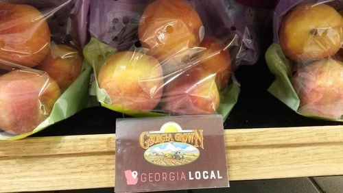 Georgia farmers were expected to have a big year for peaches and blueberries this year, a big rebound from 2017. Instead, weather took another big bite out of harvests on many farms in the state. MATT KEMPNER / AJC