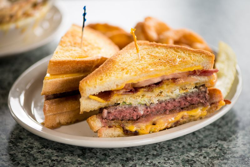 J.C.'s Vortex Burger is a half-pound of Angus beef between two grilled American cheese sandwiches. Photo credit: Mia Yakel.
