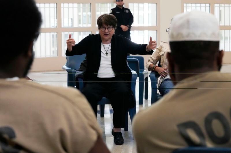 Sister Helen Prejean talks to detainees during a book club at Department Of Corrections Division 11 in Chicago, Monday, April 22, 2024. DePaul students and detainees are currently reading Dead Man Walking and the author, anti death penalty advocate, Sister Helen Prejean attended to lead a discussion. (AP Photo/Nam Y. Huh)