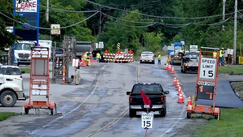 Taggart Street, which runs next to the Norfolk Southern Feb. 3 freight train derailment site, remains closed to residents, Friday, July 14, 2023, in East Palestine. (Matt Freed for the Atlanta Journal Constitution)