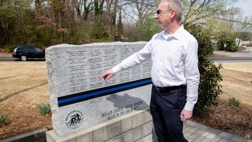 City Councilman Brian Mock talks about the Dekalb County Police Officers Killed in the Line of Duty memorial near Dresden Park in Chamblee on March 14, 2021. STEVE SCHAEFER FOR THE ATLANTA JOURNAL-CONSTITUTION