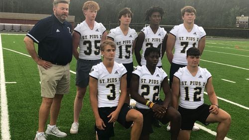 The 2021 St. Pius football team has 27 returning seniors for first-year coach Chad Garrison. The Golden Lions were photographed at the DeKalb County Media Day at Tucker High School.