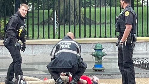 A man was arrested outside the White House on Friday after allegedly attempting to scale the fence as President Joe Biden attended the G7 summit in Britain. The man, who has not yet been identified, was stopped by Secret Service police and placed in handcuffs before he was able to make it onto the lawn.