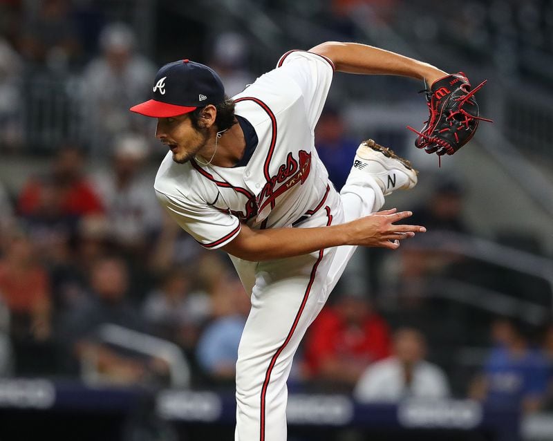 Braves pitcher Freddy Tarnok delivers against the New York Mets during the ninth inning in a MLB baseball game on Wednesday, August 17, 2022, in Atlanta.   “Curtis Compton / Curtis Compton@ajc.com