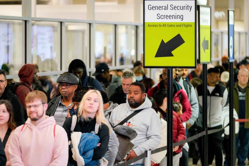 Security lines back up as holiday travelers descend on Hartsfield-Jackson International Airport on Wednesday, December 20, 2023. (Ben Hendren for The Atlanta Journal-Constitution) 