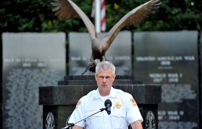 Gwinnett County Fire Chief Casey Snyder remarks during a 9/11 Public Safety Memorial Service at Gwinnett Fallen Heroes Memorial at Gwinnett Justice and Administration Center on Thursday, September 11, 2014.