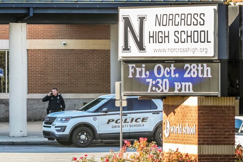 There was a visible presence of Gwinnett County School resource officers on campus at Norcross High School on Oct. 27, 2022 ,after a 17-year-old student was fatally shot Wednesday after school. (John Spink/AJC) 

