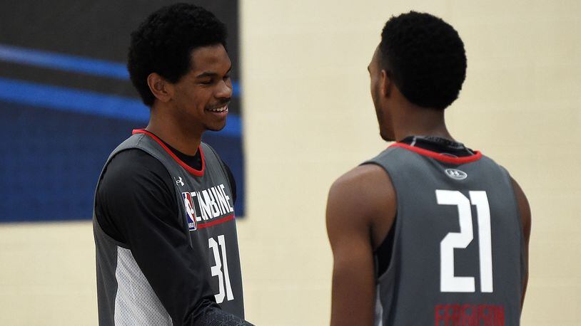 Jarrett Allen (left) speaks with Terrance Ferguson during the NBA Draft Combine at Quest MultiSport Complex on May 12, 2017 in Chicago, Illinois. (Photo by Stacy Revere/Getty Images)