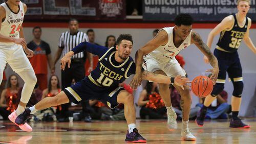 BLACKSBURG, VA - FEBRUARY 13: Jose Alvarado #10 of the Georgia Tech Yellow Jackets and Nickeil Alexander-Walker #4 of the Virginia Tech Hokies reach for the ball in the first half at Cassell Coliseum on February 13, 2019 in Blacksburg, Virginia. (Photo by Lauren Rakes/Getty Images)