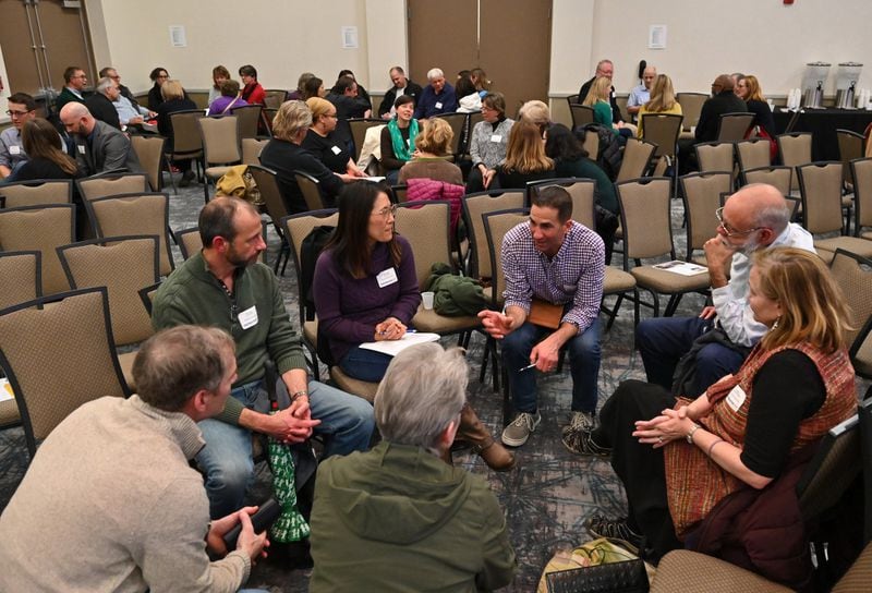 Residents meet with their assigned roundtable groups to discuss shaping Decatur’s next decade during the city’s 2030 strategic plan kick-off event at Marriott Courtyard’s Decatur Conference Center on Thursday, January 23, 2020. Decatur’s city council has aggressively tried to rid its downtown district of cars by adding bike lanes, widening sidewalks and removing lanes of traffic. Those tactics, plus extensive condo developments, have seriously aggravated traffic. (Hyosub Shin / Hyosub.Shin@ajc.com)