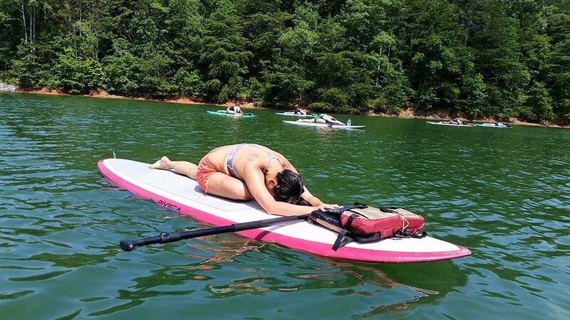 At Lake Lanier, yoga classes are offered on stand-up paddle boards. (Atlanta SUP Yoga)