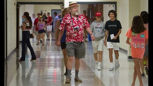 Parents and students fill the halls during an open house of the newly completed first phase of construction of Walton High School in Marietta, on Sunday, July 30, 2017. All of the construction is scheduled to be completed mid-2019.
