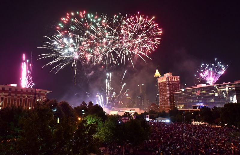 Fireworks light up the downtown Atlanta skyline during Centennial Olympic Park's Fourth of July Celebration on Monday, July 4, 2016. (HYOSUB SHIN / HSHIN@AJC.COM)
