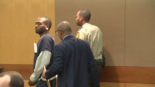 Uber Eats driver Robert Bivines appeared in court Tuesday. He is accused of killing Ryan Thornton outside his Buckhead condominium.