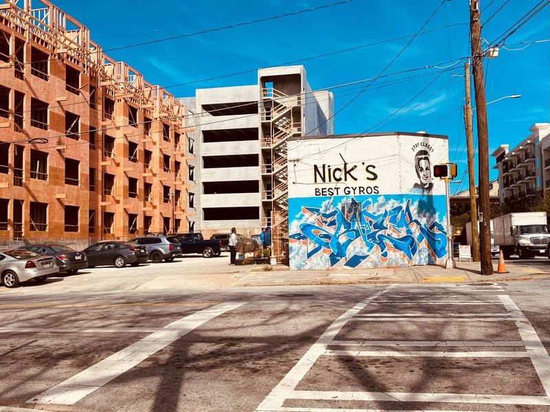 After 28 years, Nick's Food to Go is surrounded by new construction. Bob Townsend for The Atlanta Journal-Constitution

