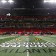 The championship logo is seen on the field at Mercedes-Benz Stadium before the NCAA college football playoff championship game between Georgia and Alabama, Monday, Jan. 8, 2018, in Atlanta. (AP Photo/David Goldman)