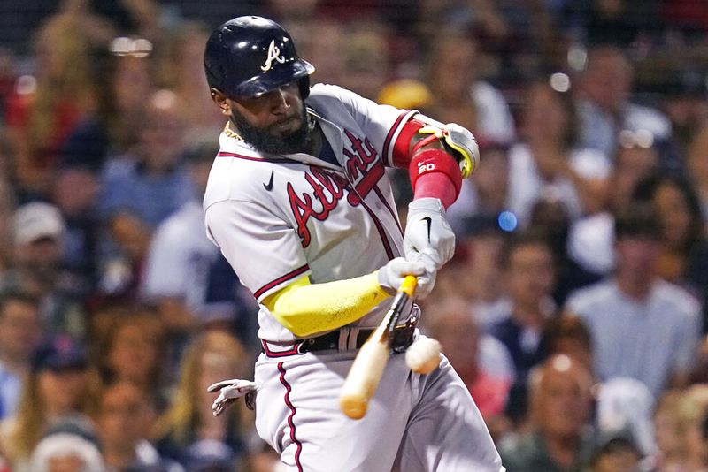 Atlanta Braves' Marcell Ozuna connects for a three-run home run off Boston Red Sox starting pitcher Nick Pivetta during the fourth inning of a baseball game Wednesday, Aug. 10, 2022, in Boston. (AP Photo/Charles Krupa)