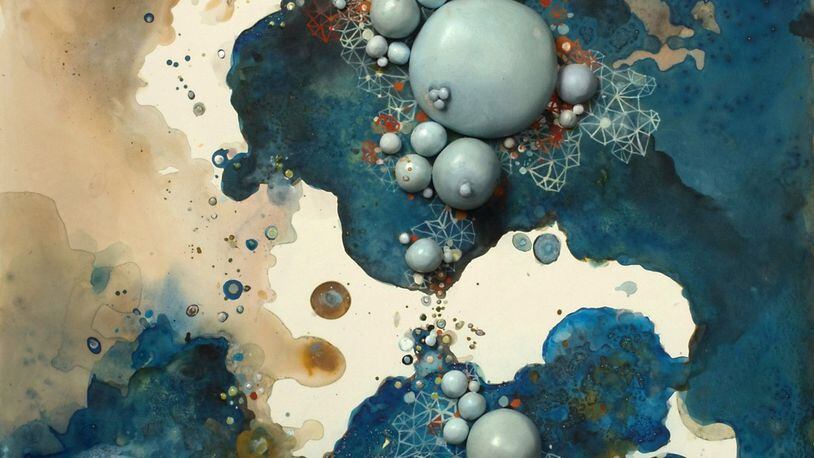 Paintings in acrylic, ink and painted clay like “Simmer” can suggest solar systems or the creation of some new form and express artist Laura Bell’s themes of flux, change and transformation.