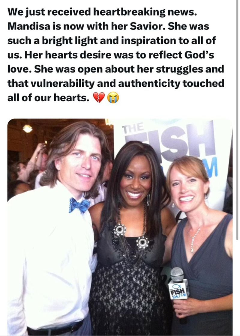 Kevin Avery and Taylor Scott of Fish 104.7 pose with Mandisa in an undated photo. CONTRIBUTED