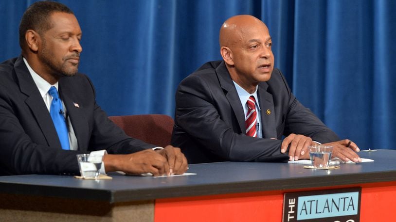 Vernon Jones (left) and Dekalb Sheriff Jeff Mann square off in a debate at the PBA 30 studios on July 10. DeKalb’s former CEO, Jones, is trying to regain power by unseating Sheriff Jeff Mann, a career insider who rose through the ranks. They’ll face off July 22 in the special election to run the DeKalb County Sheriff’s Office. KDJOHNSON/KDJOHNSON@AJC.COM