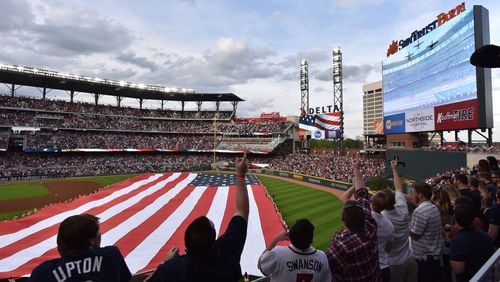 Atlanta Braves fans cheer before a game during SunTrust Park's opening weekend in 2017.