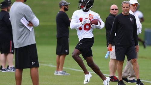Wide receiver Calvin Ridley runs out of bounds after catching a bomb on the first day of mandatory mini-camp on Tuesday, June 12, 2018, in Flowery Branch.  Curtis Compton/ccompton@ajc.com