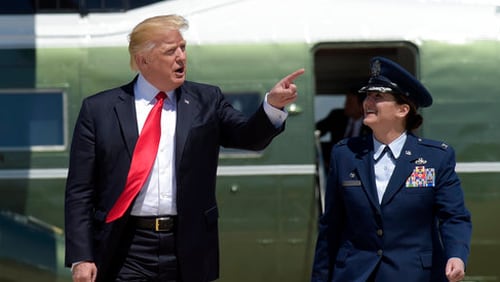 President Donald Trump walk towards Air Force One at Andrews Air Force Base in Md., Tuesday, April 18, 2017. Trump is heading to Kenosha, Wis., to visit the headquarters of tool manufacturer Snap-on Inc., and sign a an executive order that seeks to make changes to a visa program that brings in high-skilled workers. (AP Photo/Susan Walsh)