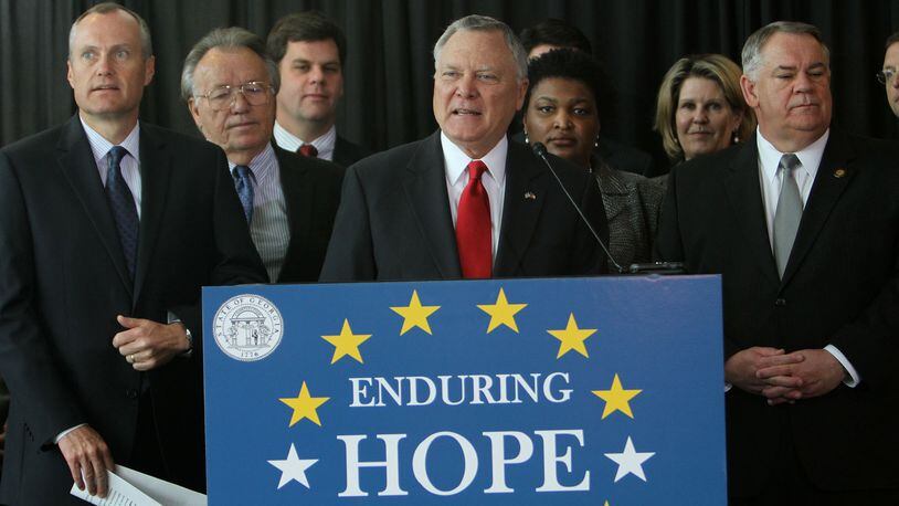 Georgia Gov. Nathan Deal and other lawmakers outline a sweeping overhaul of HOPE scholarship and prekindergarten programs to keep them from going broke during a press conference at the State Capitol on Feb. 22, 2011. AJC FILE PHOTO.