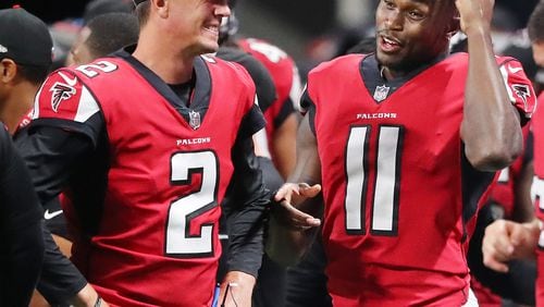 August 31, 2017 Atlanta: Falcons quarterback Matt Ryan and wide reciever Julio Jones, who both did not play in the game, share a laugh on the sidelines during the 4th quarter of their final preseason game against the Jaguars in a NFL football game on Thursday, August 31, 2017, in Atlanta.    Curtis Compton/ccompton@ajc.com