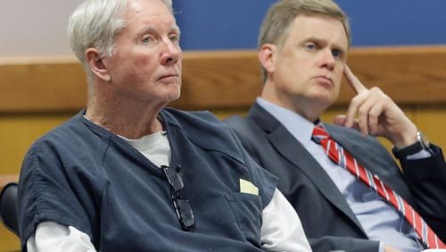The trial of Claud “Tex” McIver (left) has been delayed until March. Here, McIver is seated next to one of his attorneys, Joe Sharp, during a pretrial motion. BOB ANDRES /BANDRES@AJC.COM
